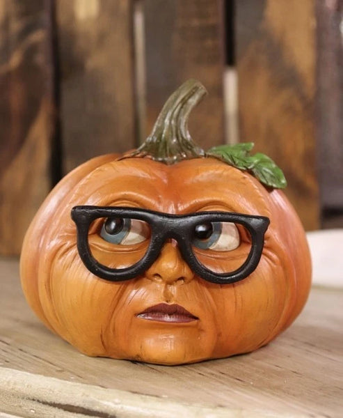 Pumpkins with glasses