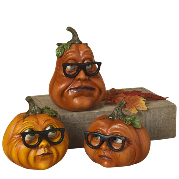 Pumpkins with glasses