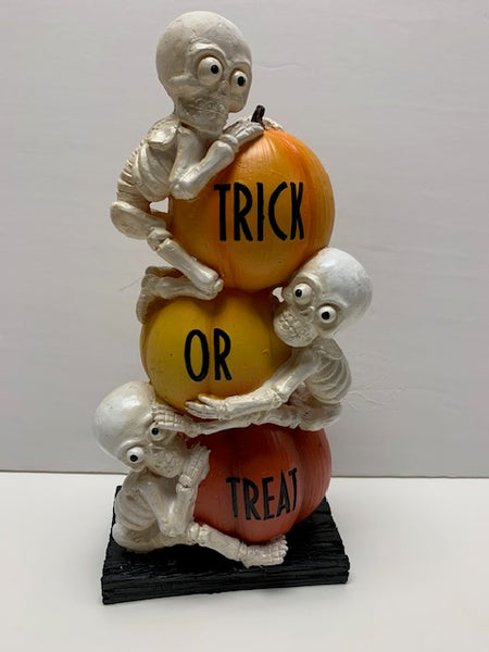 Stacked Skeletons and pumpkins